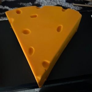 The Offical Greenbay Packers Cheese Head Hat. Brand new never worn.